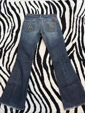 Women’s Medium Wash Flared  7 Jeans with Embroidered Back Pockets